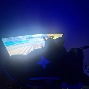 Louis Vuitton Black Sneakers with Blue Monogram Accent